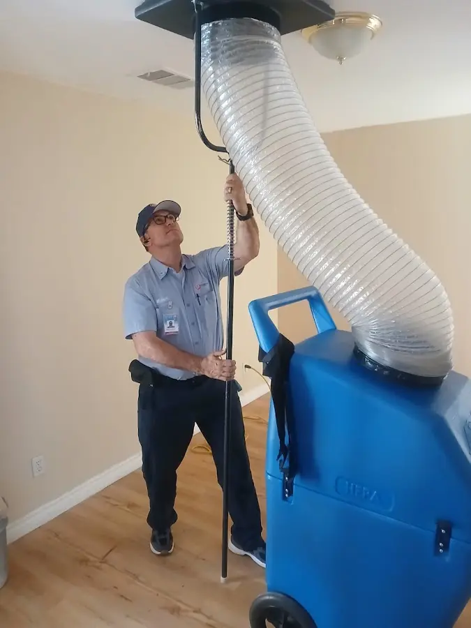 Furnace Tune-Up technician using HEPA equipment in Gaithersburg